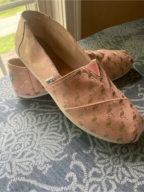 TOMS Pink Canvas Slip-Ons with Gold Flamingo Print